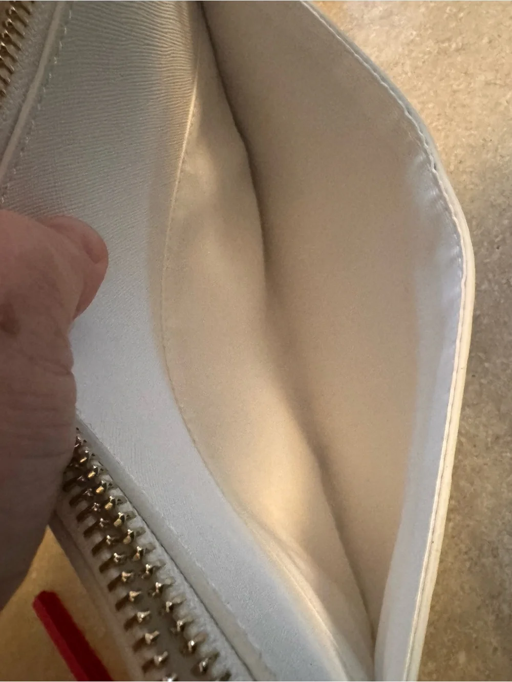 White House/Black Market hydrangea wristlet clutch with silver stud details
